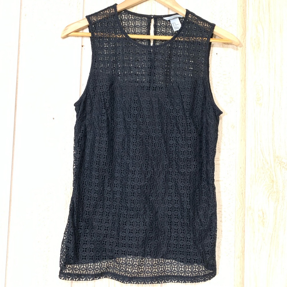 H & M it’s for women blouse. Color Black Size M